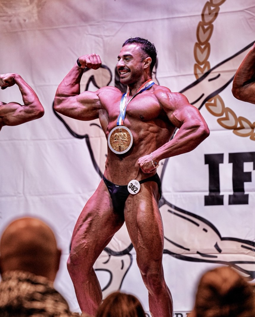 Joss on stage after winning the Champion de France IFBB title